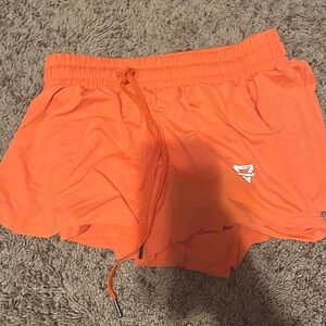 Neon orange shorts